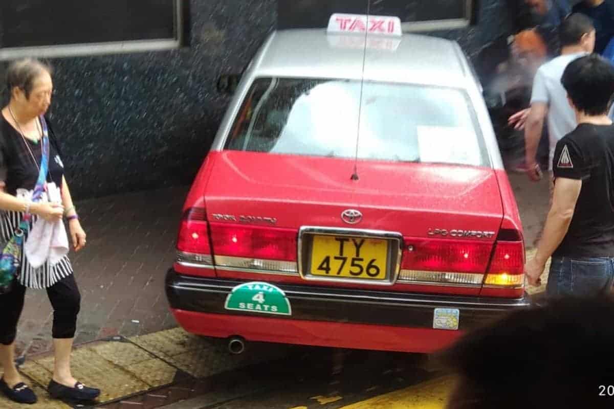 Taxi strikes pedestrian after swerving to avoid hitting man in wheelchair