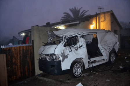 Taxi flies off from the road, lands on residential roof