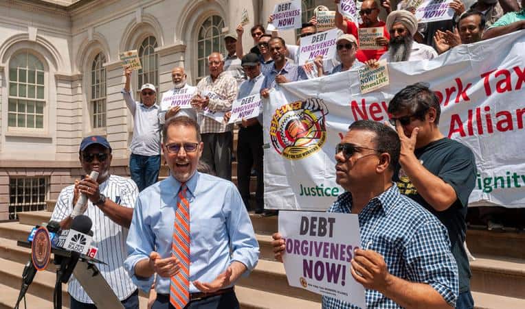 NYC taxi drivers rally at City Hall for loan relief (New York, USA)