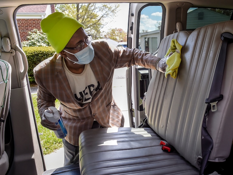 Traore keeps his taxi disinfected between rides in Rockville.