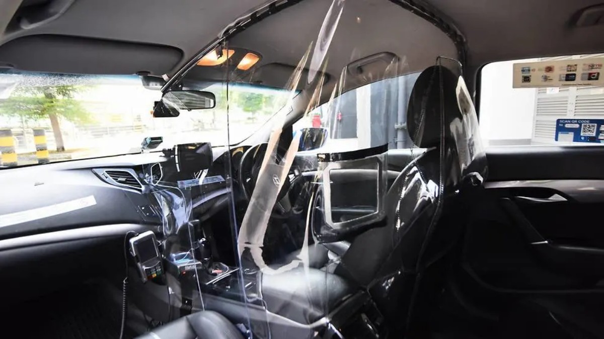 Taxis in Singapore will be outfitted with plastic isolation shields to protect drivers against COVID-19